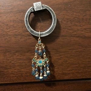 Blue-green chandelier earrings.